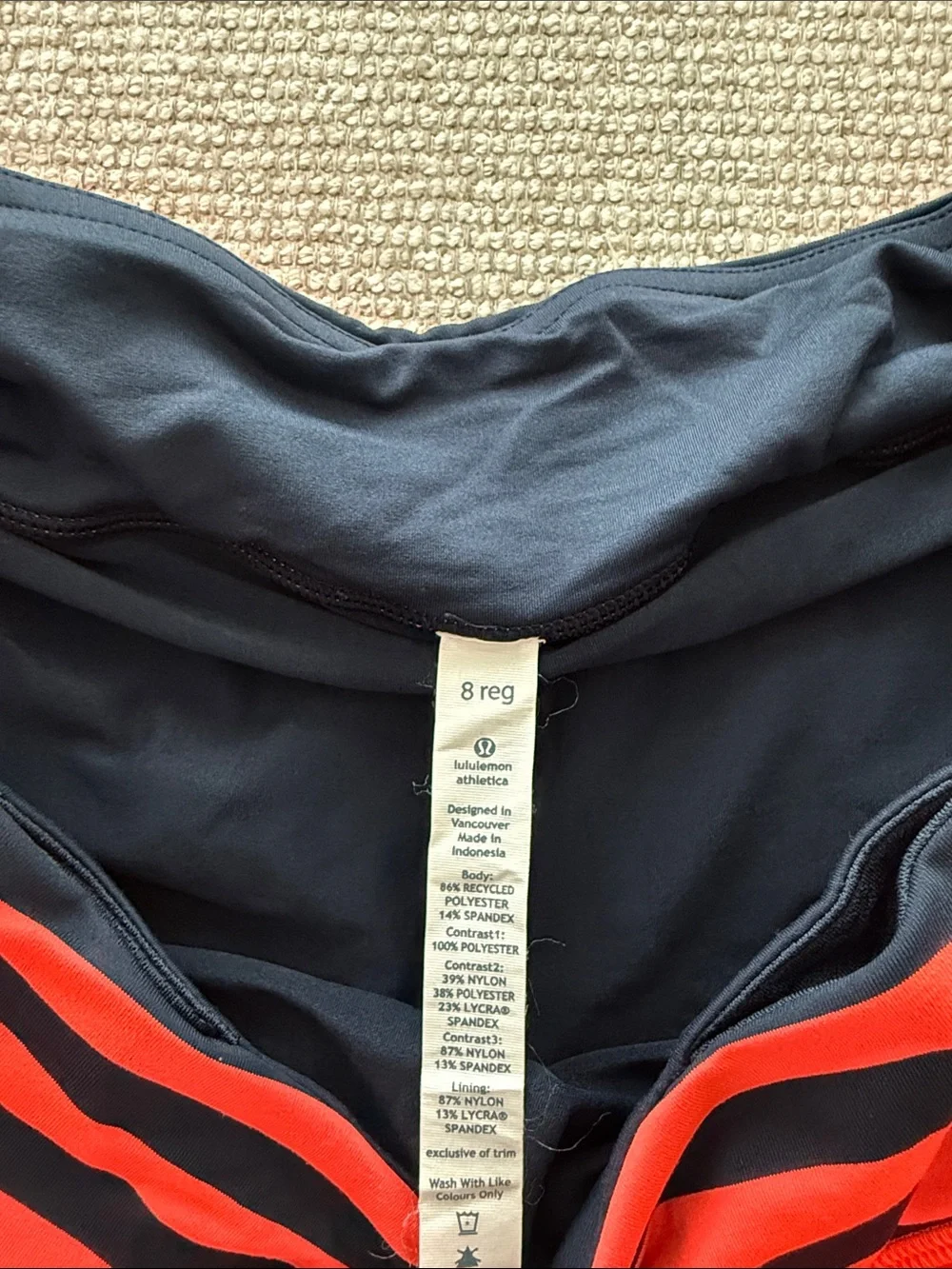 Lululemon neon orange/coral and navy skirt